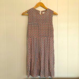 Knee-length sleeveless painted polka dot dress